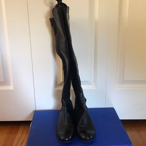 Leather over the knee boots with stretch back.